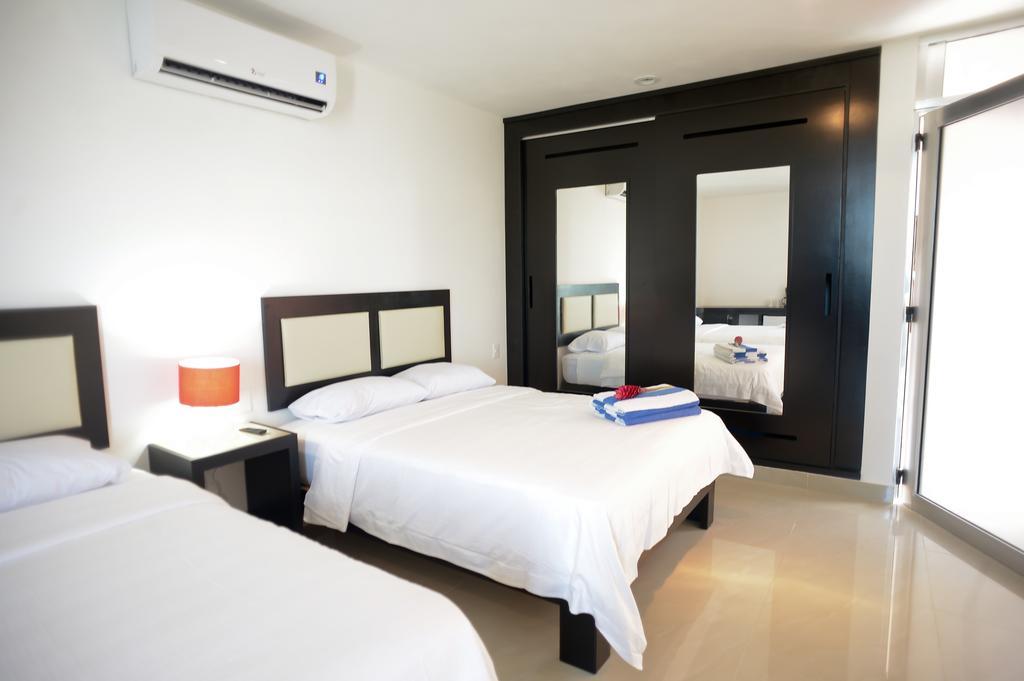 Sunrise 42 Suites Hotel Πλάγια Ντελ Κάρμεν Δωμάτιο φωτογραφία